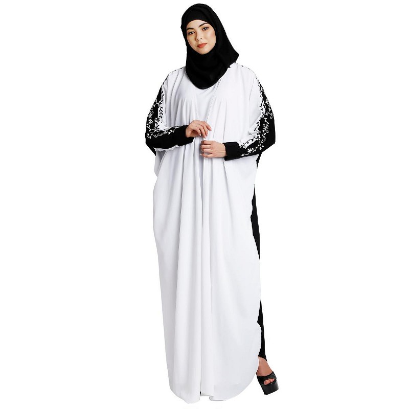 white and black abaya