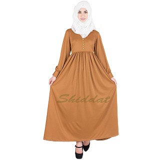 Golden colored Abaya with  pearl buttons