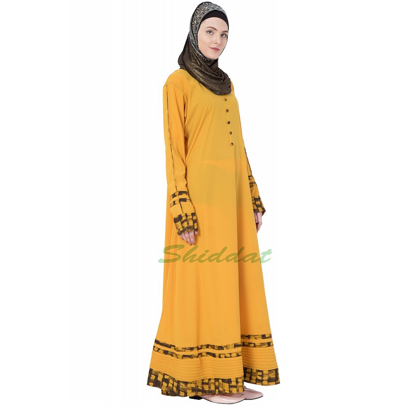 Casual abaya Mustard colored abaya with printed border